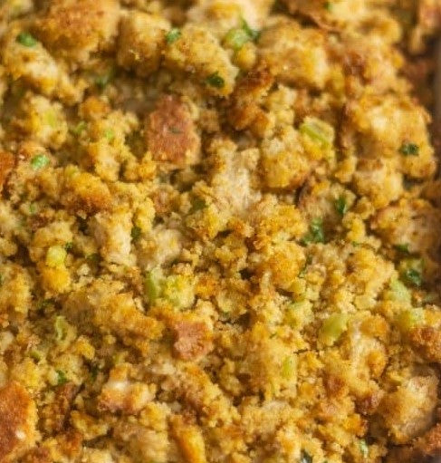 Homemade cornbread dressing in a pan